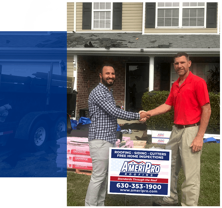 Home owner and AmeriPro employee shaking hands in front a home with a roof that needs repaired